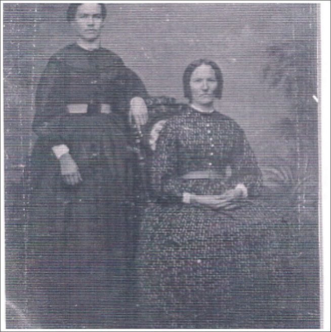 Mary Jane Udell and Mrs. John Udell seated, according to Lunau family records. Given ages likely Margaret Westunberger.